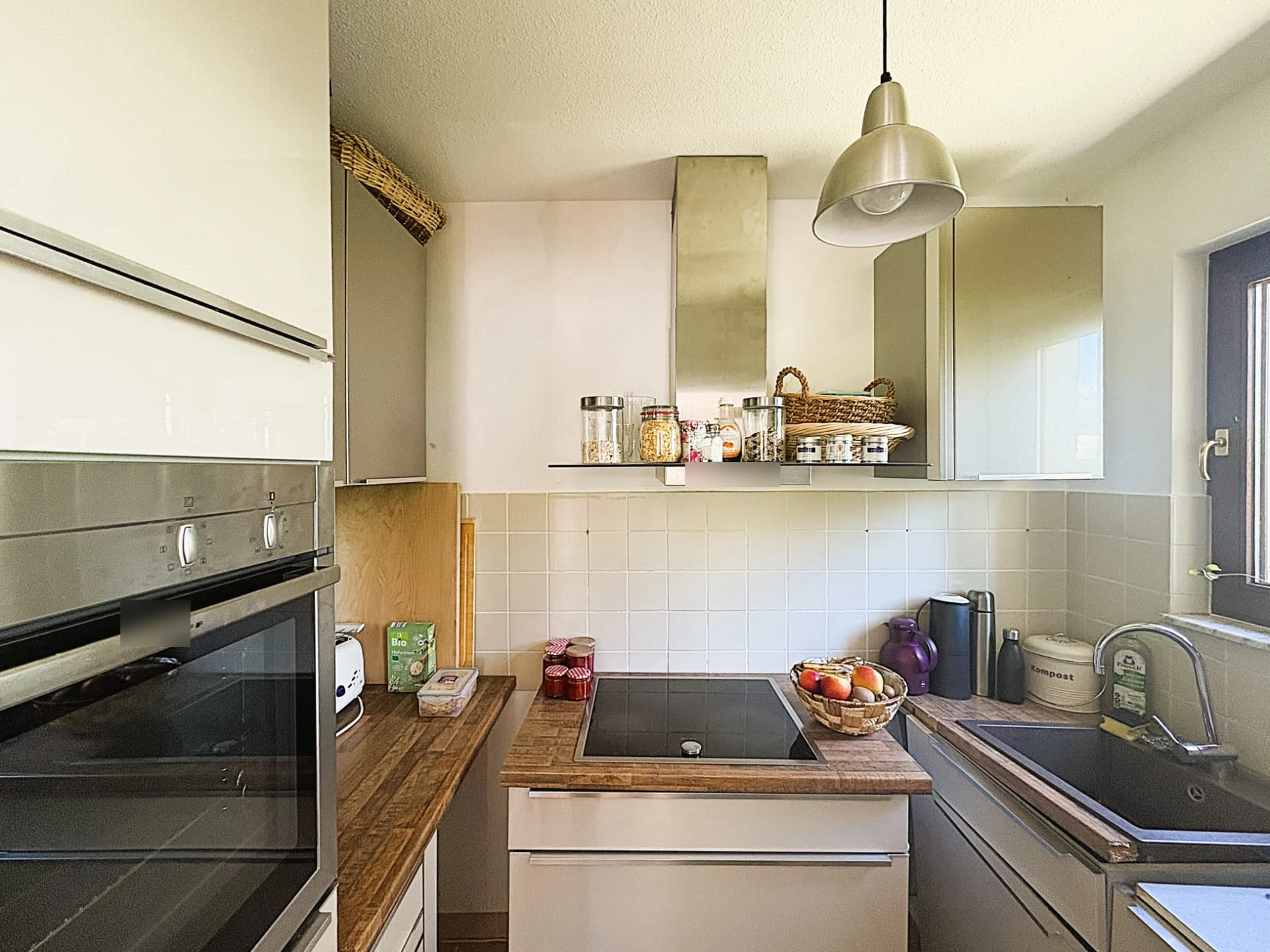 Fitted kitchen with window