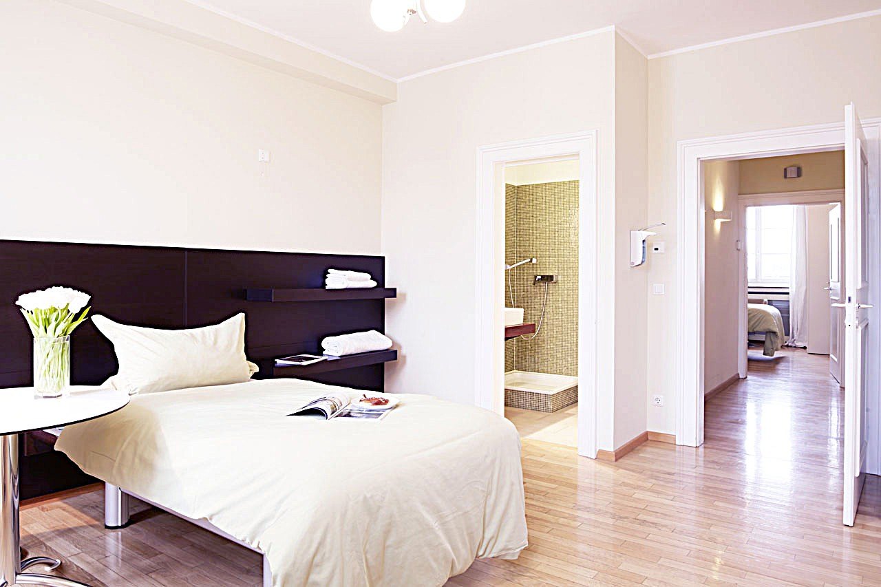Patientenzimmer im Boutiquehotel-Stil mit eigenem Bad