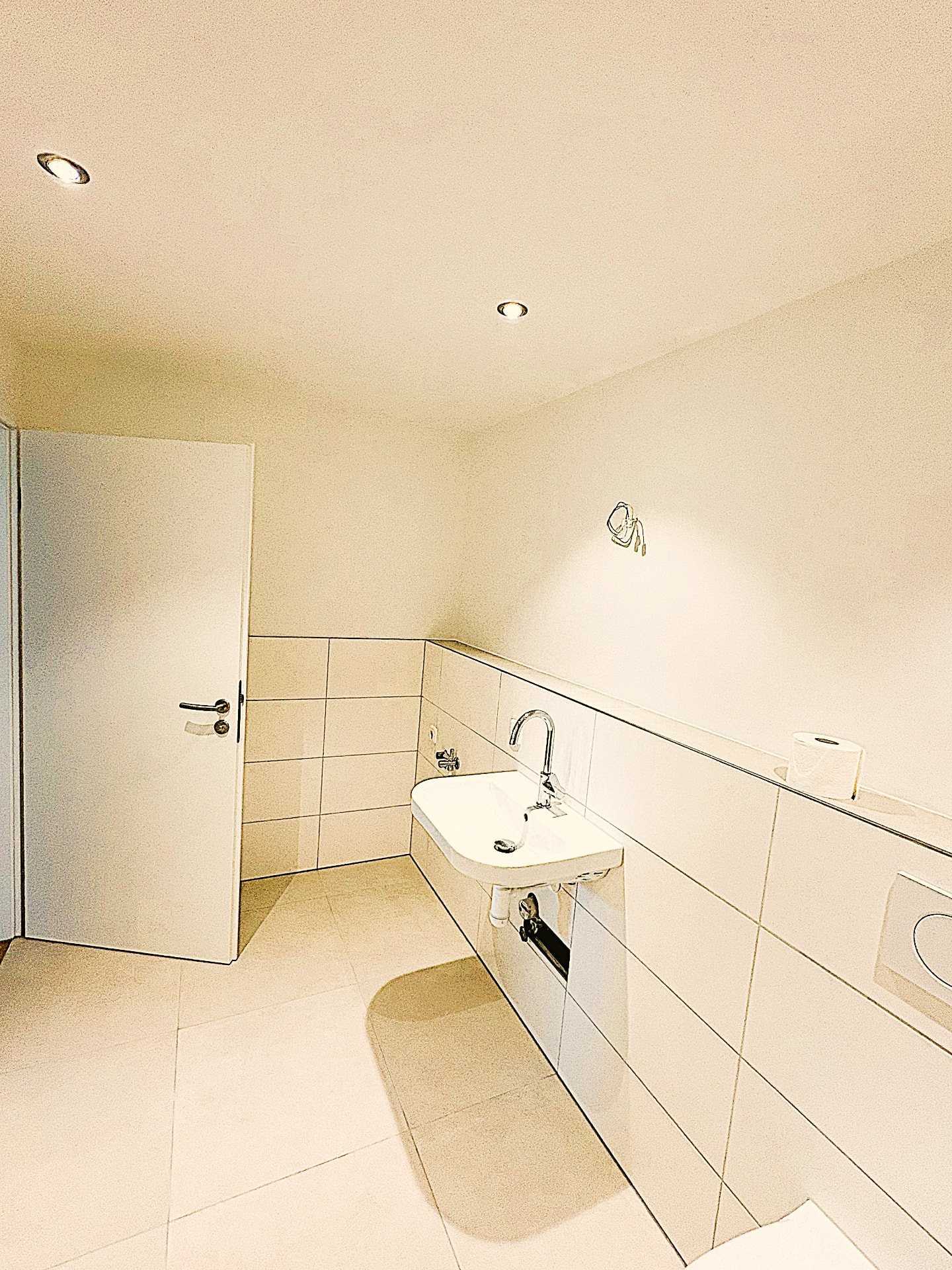 Walk-in shower with towel warmer