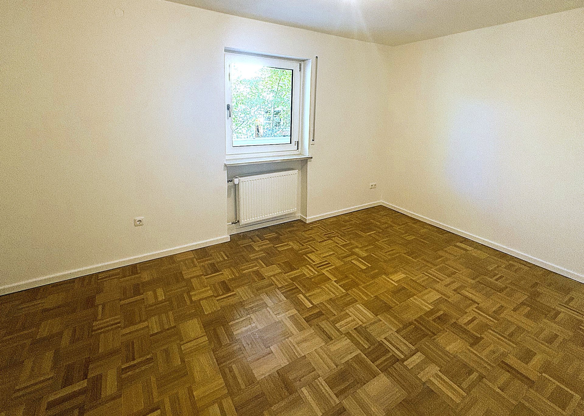 Bedroom with window and new radiator