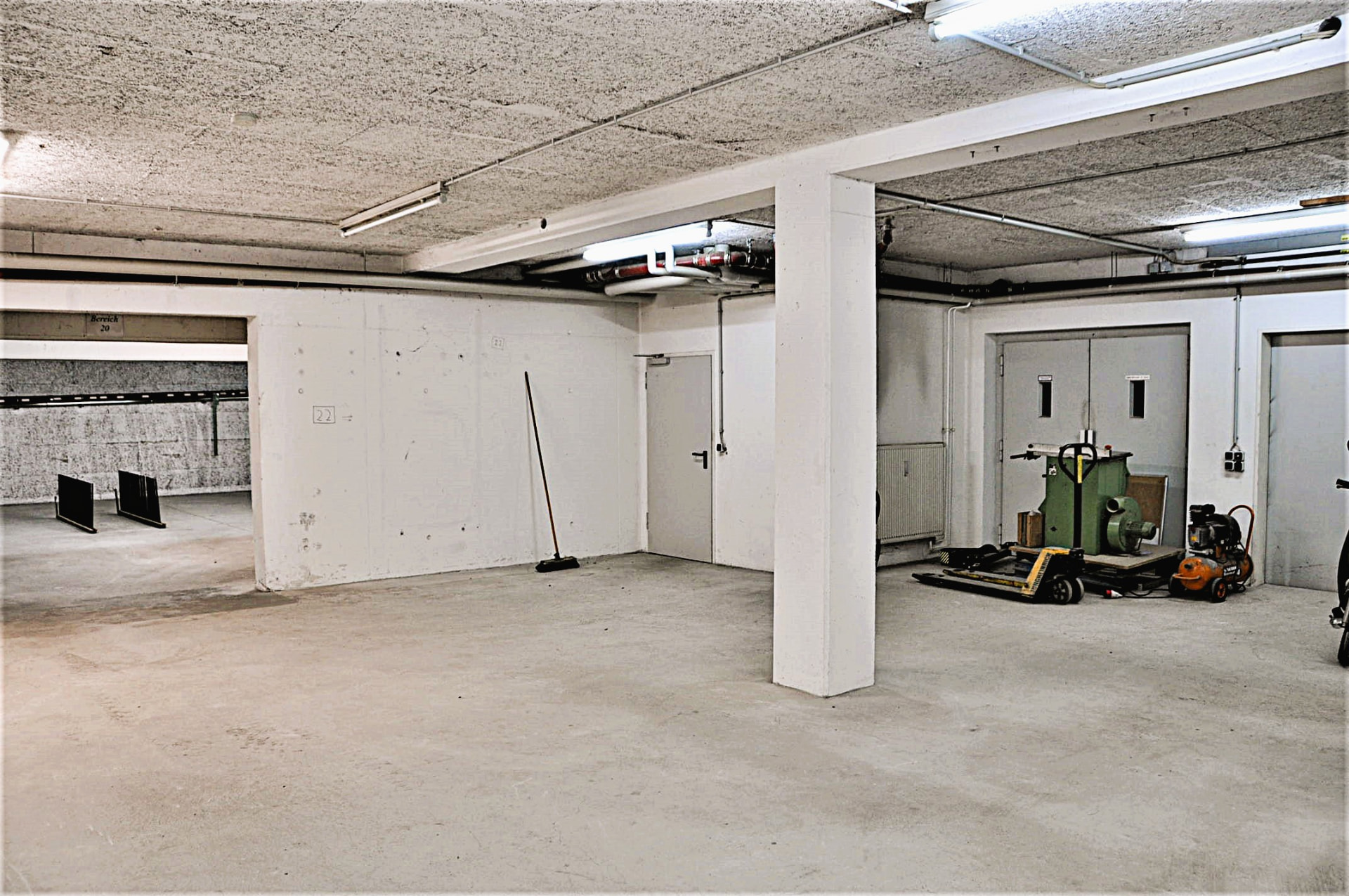 Divisible storage area with access to ancillary rooms