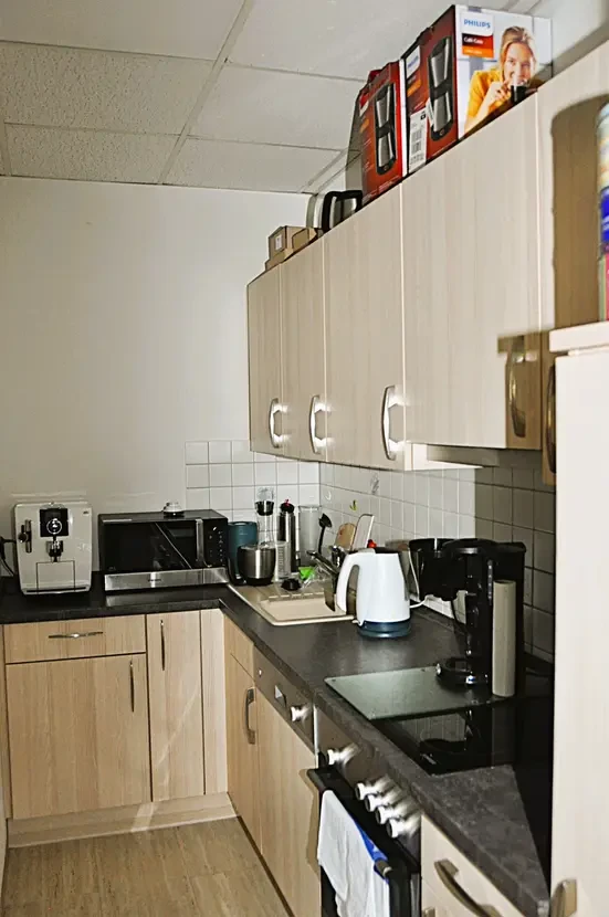 Kitchenette on the first floor with fitted units