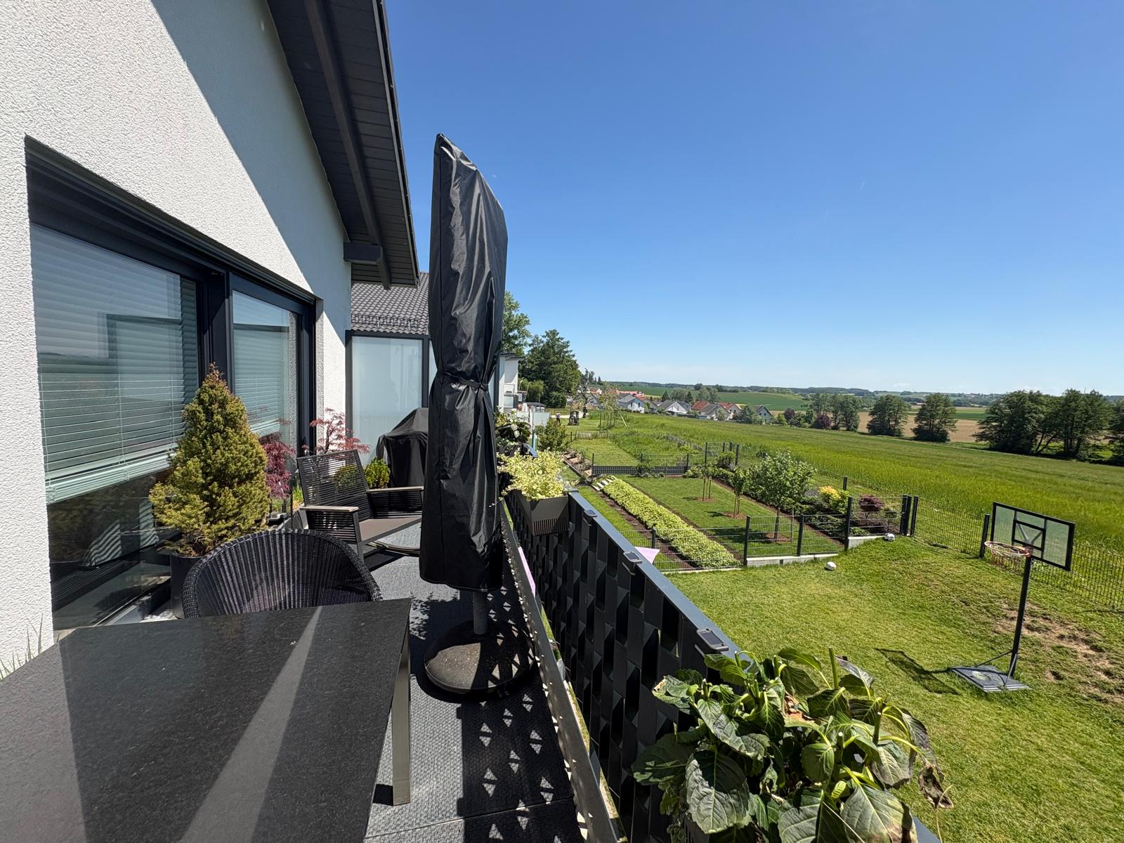 View from the balcony into the unobstructed green valley