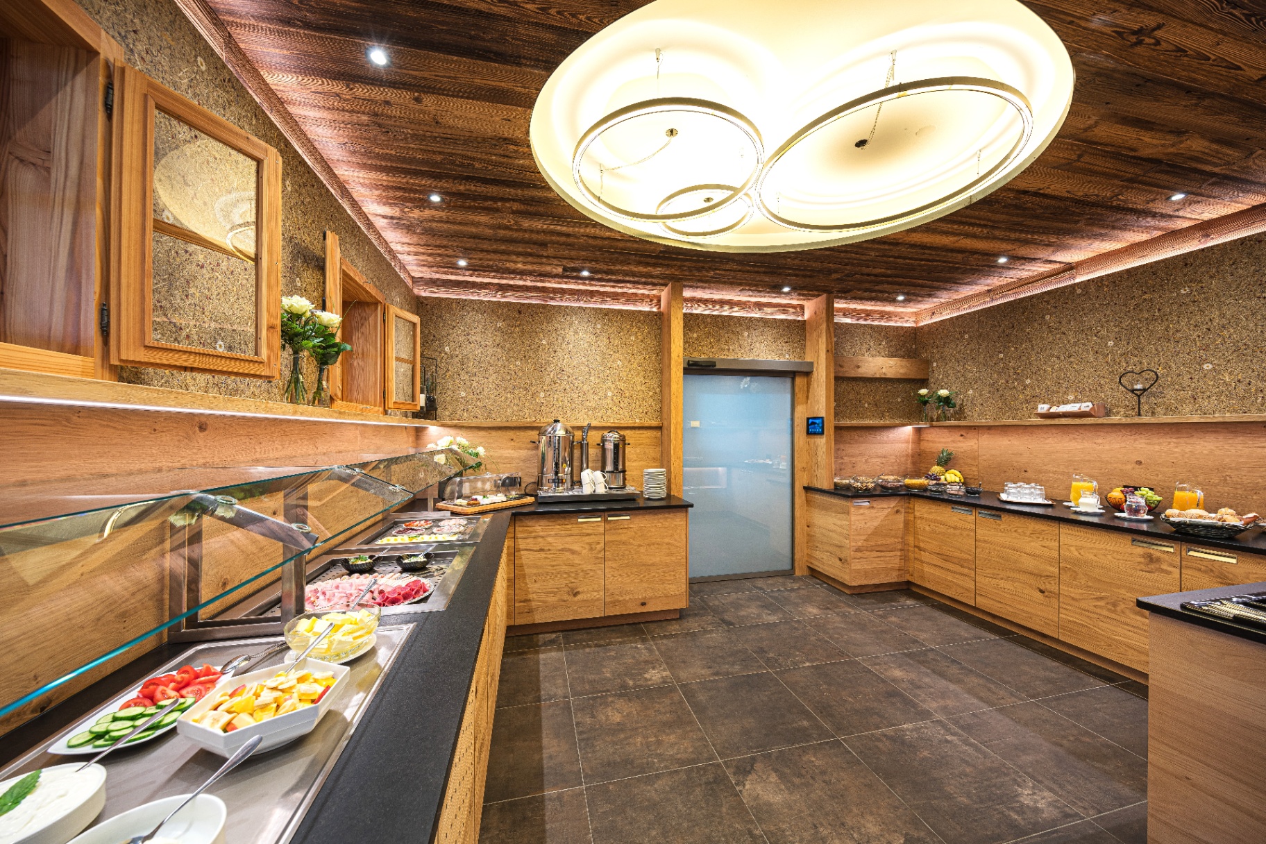 Breakfast room with refrigerated counter and elegant wooden furnishings