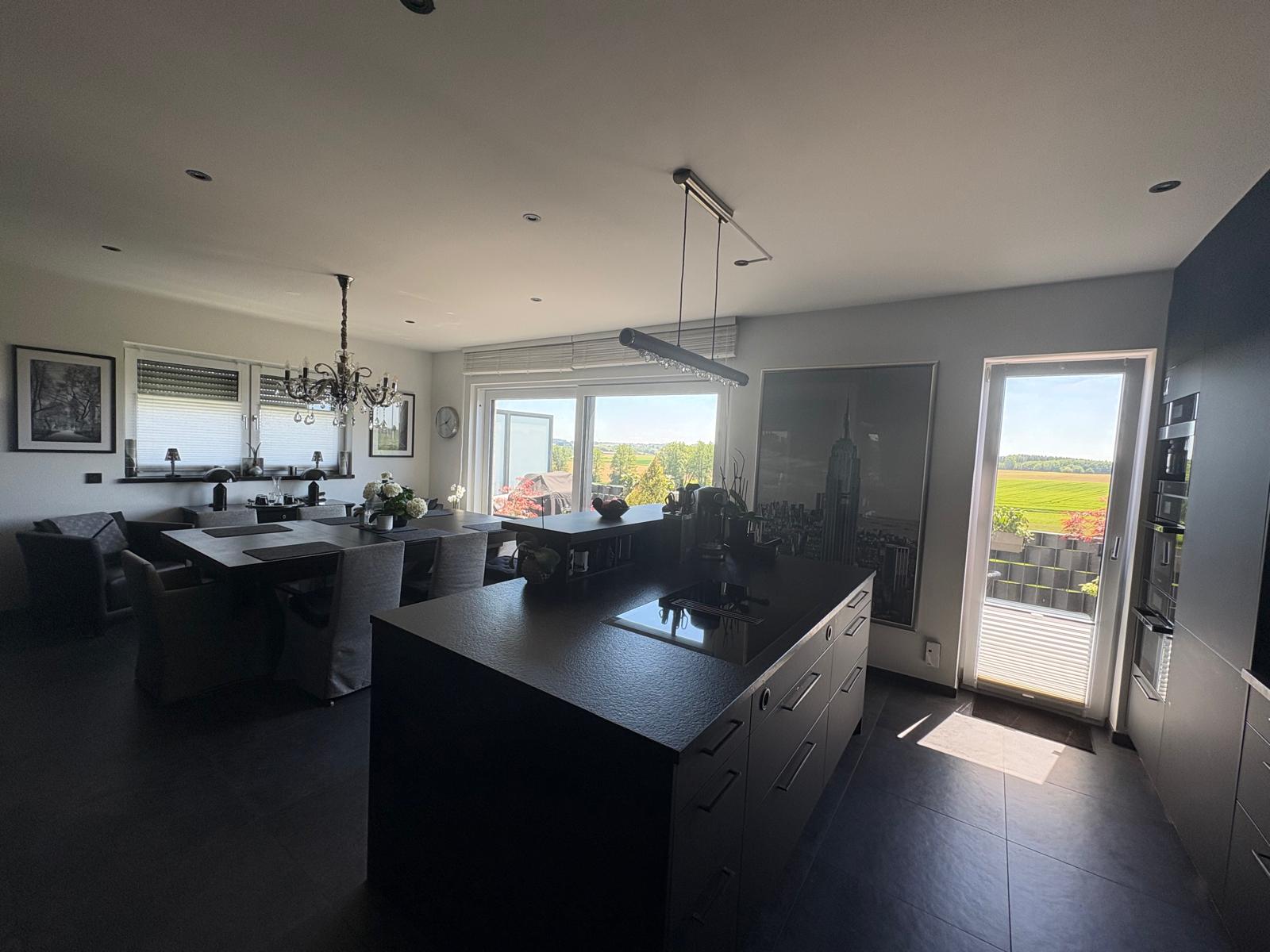 Dining table with panoramic view of the unobstructed greenery